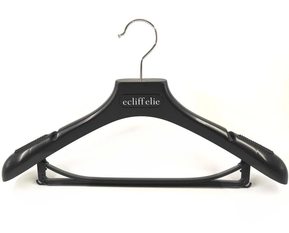 Cost effective plastic suits and coat hanger with crossbar