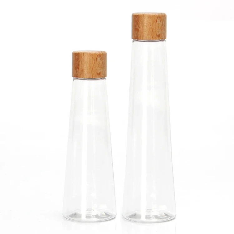 Unique Bulk Empty Elegant Cold Pressing Juice Fresh Juice Pyramid Plastic Milk Tea Juice Bottle