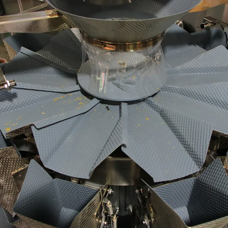 Qualipak Small sachet dry fruit nut salt peanut snack bag food automatic packing machine with scale