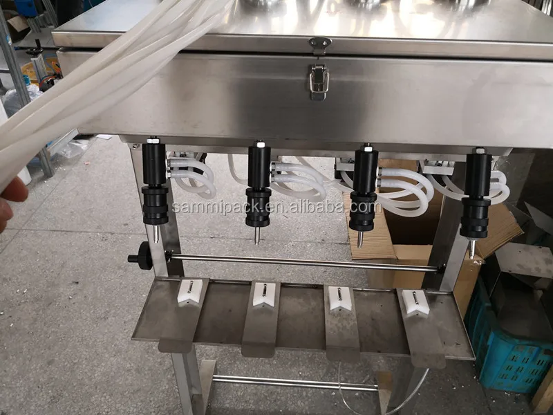4 heads, semi-automatic pneumatic vacuum machine for filling machine perfume bottles for liquor
