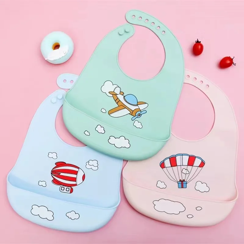 Waterproof Soft Baby Feeding Silicone Bibs Met Gala BPA Free Printed Silicone Baby Bibs For Kids