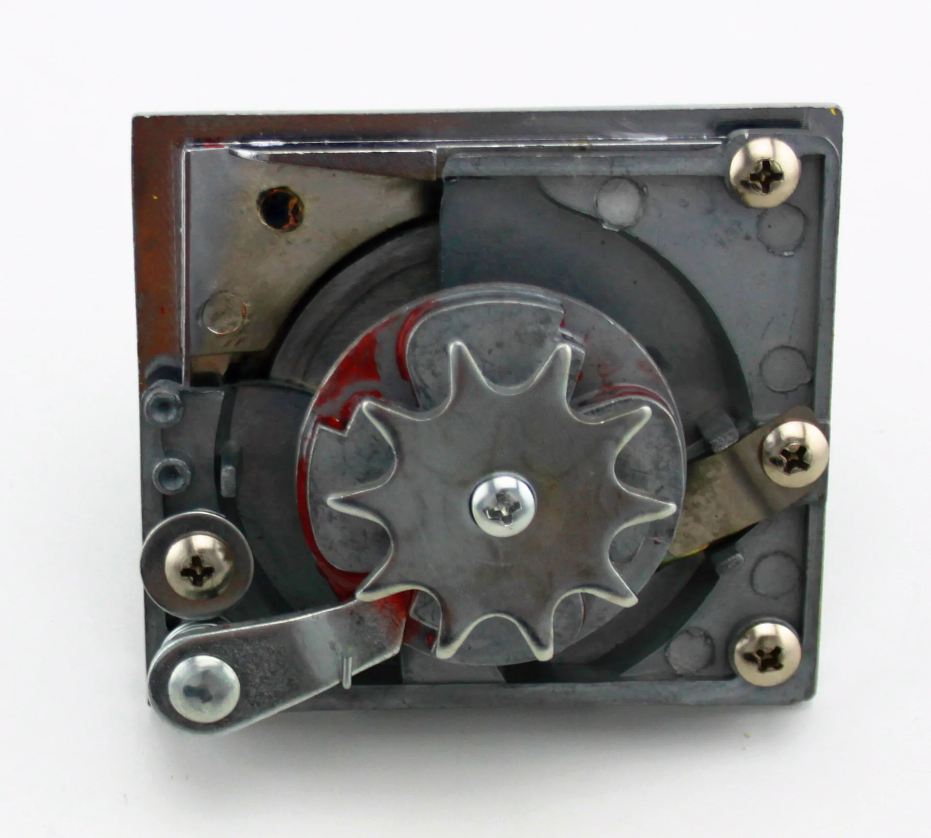 Chrome plated metal coin mechanism for coin operated vending machine