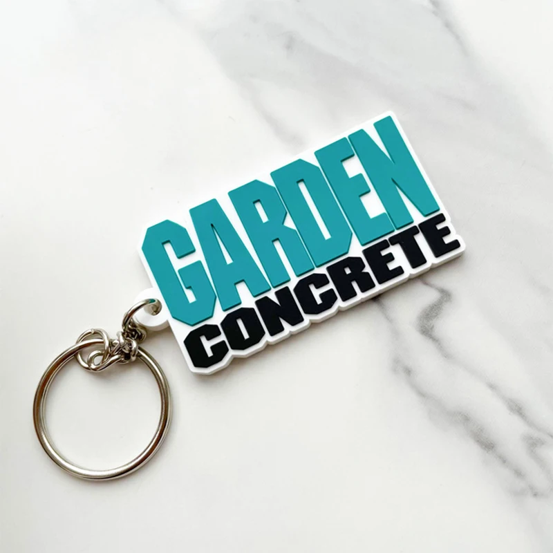 Personalized promotional soft pvc logo 2D rubber gift key chain custom logo letter keychain cute fashion key holder