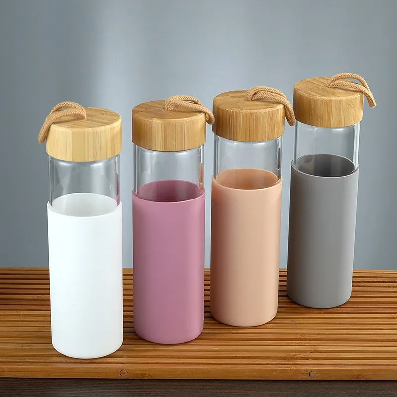 Wholesale  550ml Eco-friendly Bamboo Lid Silicone Sleeve Durable Borosilicate Glass Water Bottle