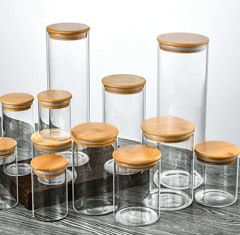Customized Wholesale 1 2 4 8 oz Small Mini large Size Clear Frosted Honey Food Empty Storage Bottle Glass jars with Bamboo Lids