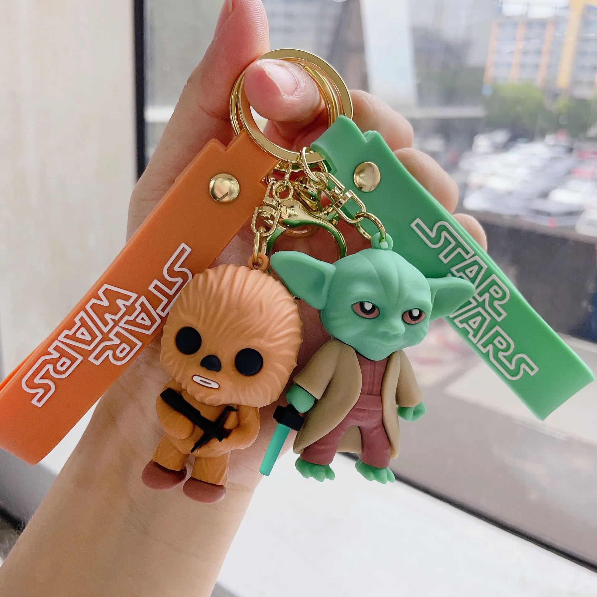 Cartoon Star Wars Keychain 3D Pvc Character Holding Weapon Cute Yoda Cool Keychain Pendant Decoration