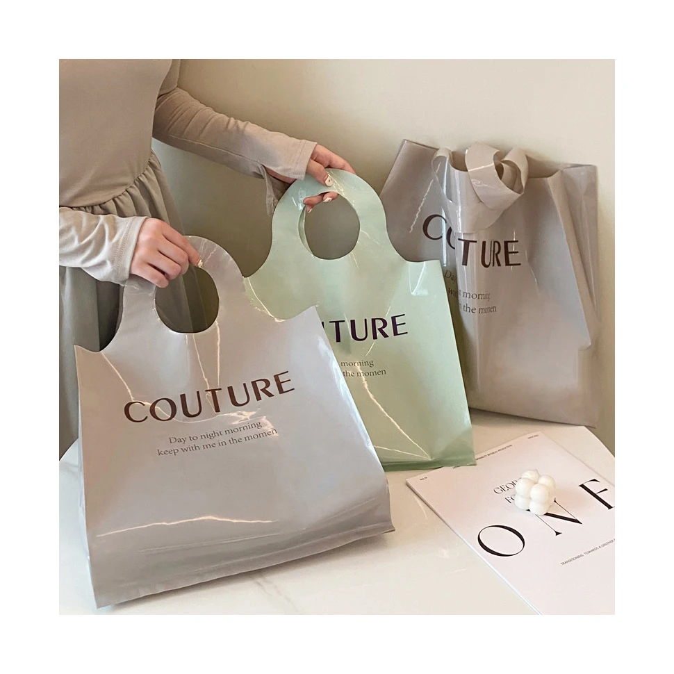 Explosive clothing store thickened plastic portable shopping bags clothes with gift packaging bag spot wholesale
