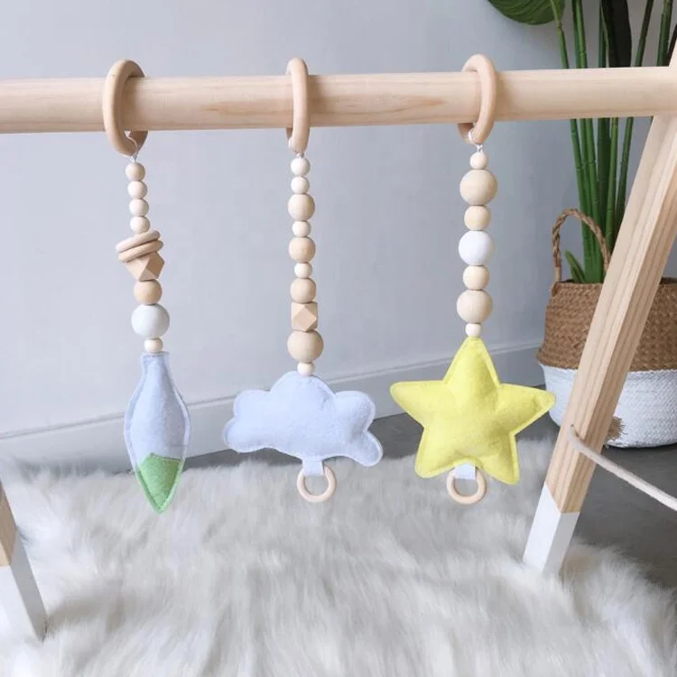 
Hot Selling Plain Portable Safety Material Home Crib Gym Activity Cute No Frame Wooden Baby Hanging Toys 