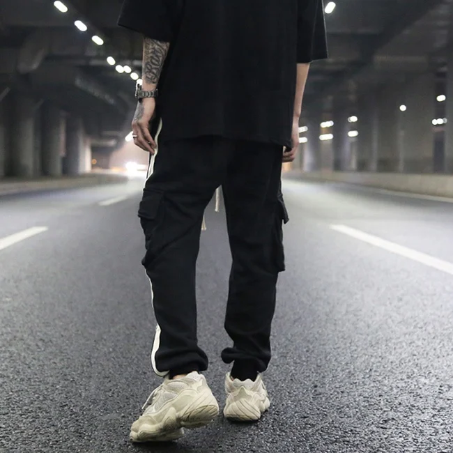 OEM hot sale black side stripe jogger pants casual elastic waist draw string streetwear cotton teen hiphop trousers stock