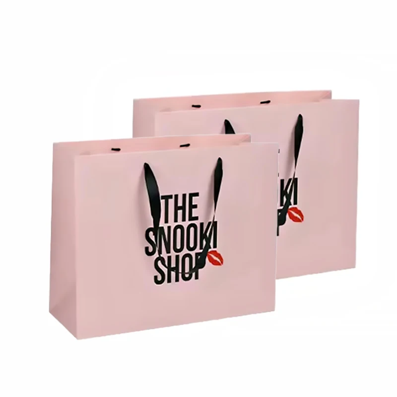 Eco-Friendly Materials Luxury Brand Custom Logo Boutique Pink Packaging Gift Paper Shopping Bag for Clothes
