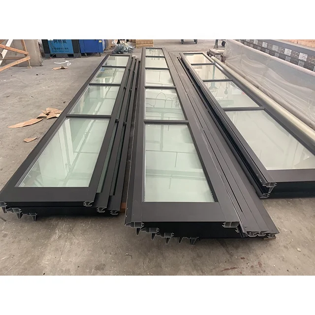 Commercial cheap aluminum alloy exterior frosted glass modern new black sectional panel garage door for homes