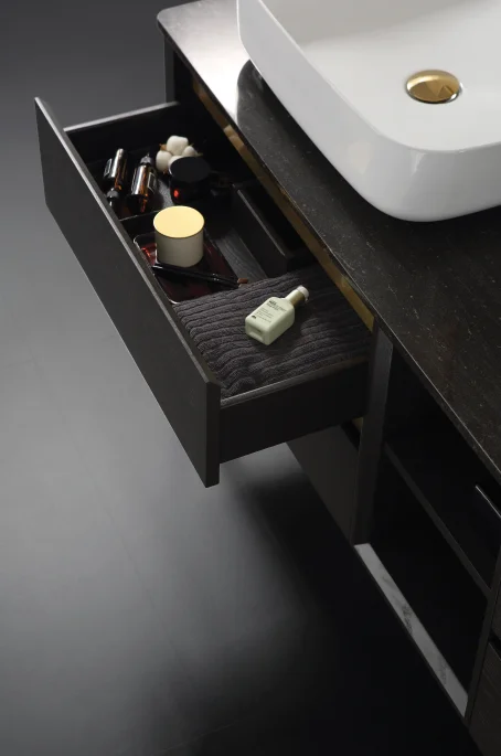 Double sink bathroom vanity with gold hardware