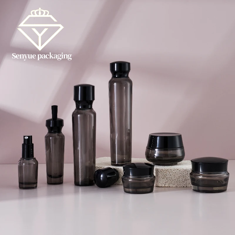 Chinese Manufacturer New Design Shape Glass Bottle And Cream Jars Empty Luxury Black Lotion Glass Bottles For Skin Care