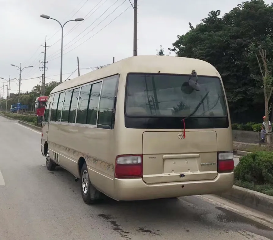 LHD 2016 Japan used good condition Toyotai coaster bus with diesel engine 25 seats golden silvery for seal