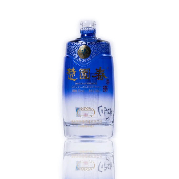 wholesale custom design 500ml round shape liquor glass bottles