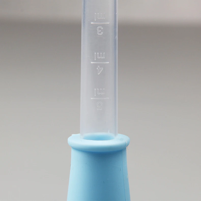 Newborn baby with scale silicone dropper feeder