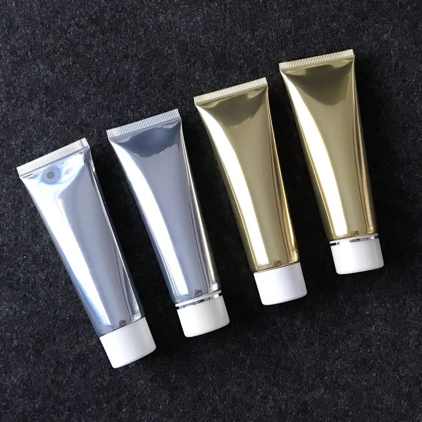 luxury high quality 50ml 100ml shiny soft aluminum plastic tube silver/gold aluminum cream soft tube serum bottle with flip lid