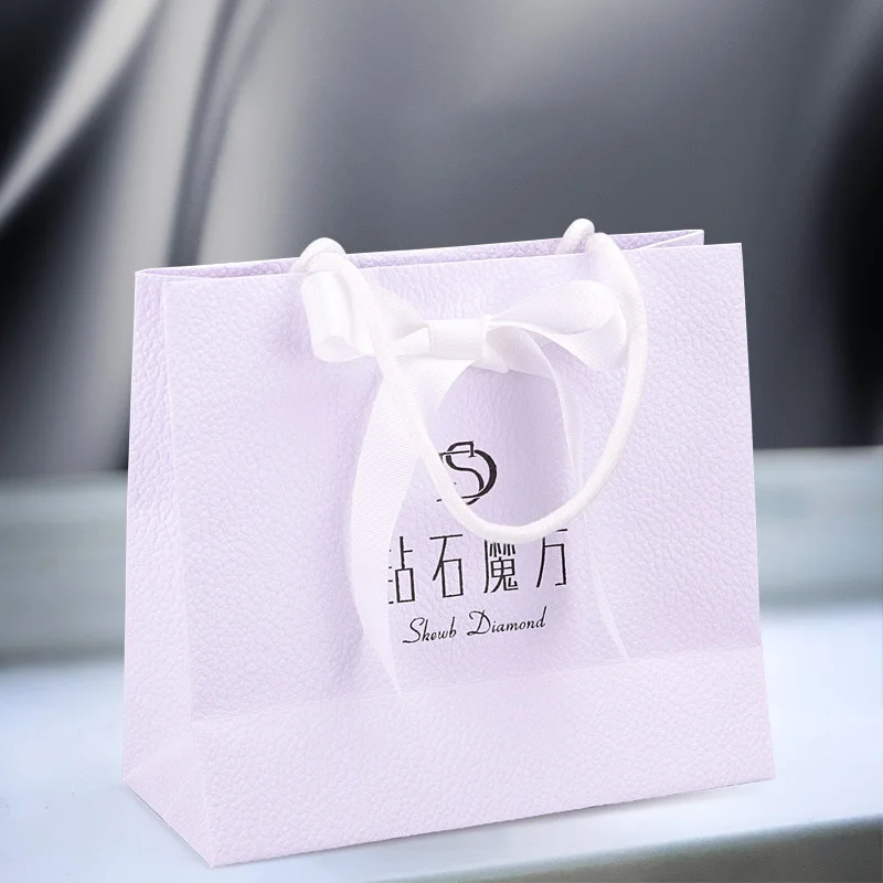 Luxury White Lychee Pattern Jewelry Gift Packaging Recycled Thick Textured Shopping Paper Bag for Clothing