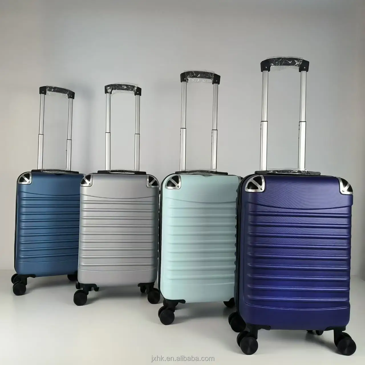 High quality Plastic Shell Durable Suitcase Online Wholesales Luggage Travelling Bags Iron or Aluminum Trolley Bag Spinner Wheel