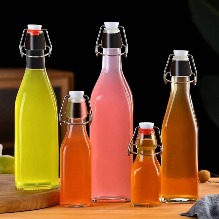 Custom multiple 500ml 750ml 1L swing top cork beverage beer glass water wine bottle with clip stopper