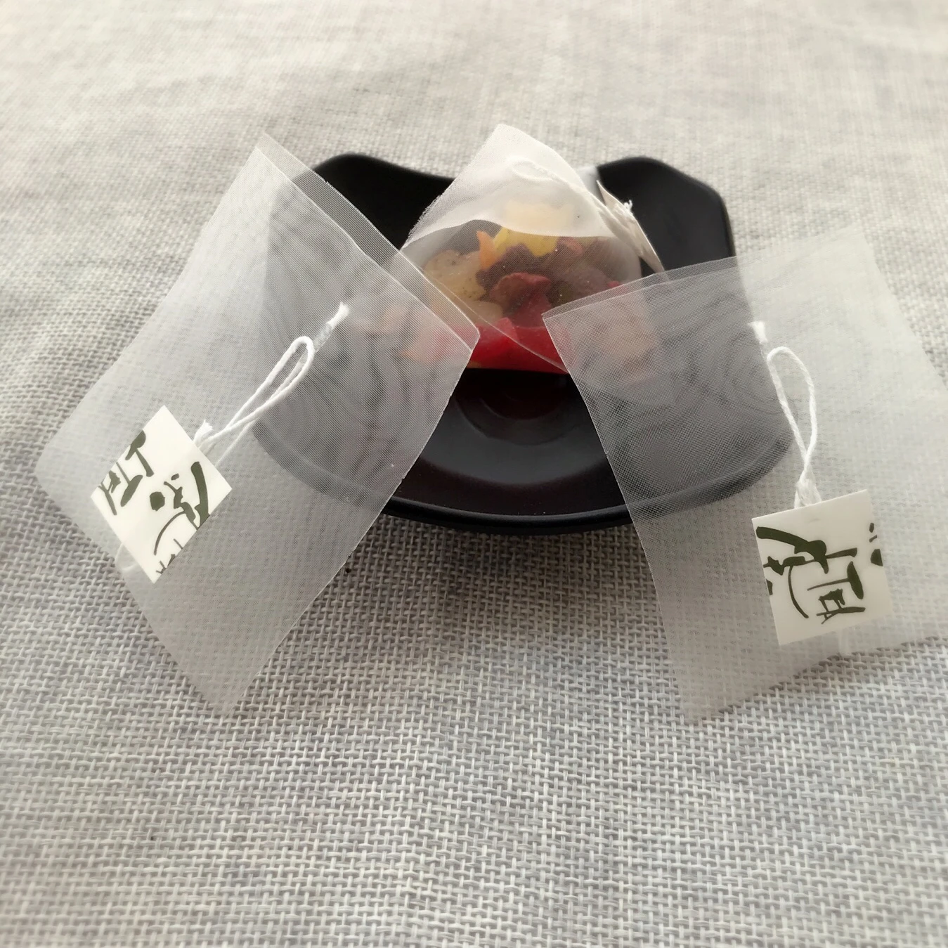 Wholesale Tea Supplier Custom Biodegradable Corn Fiber PLA Material Filter Empty Pyramid Herbal Tea Bags Packaging