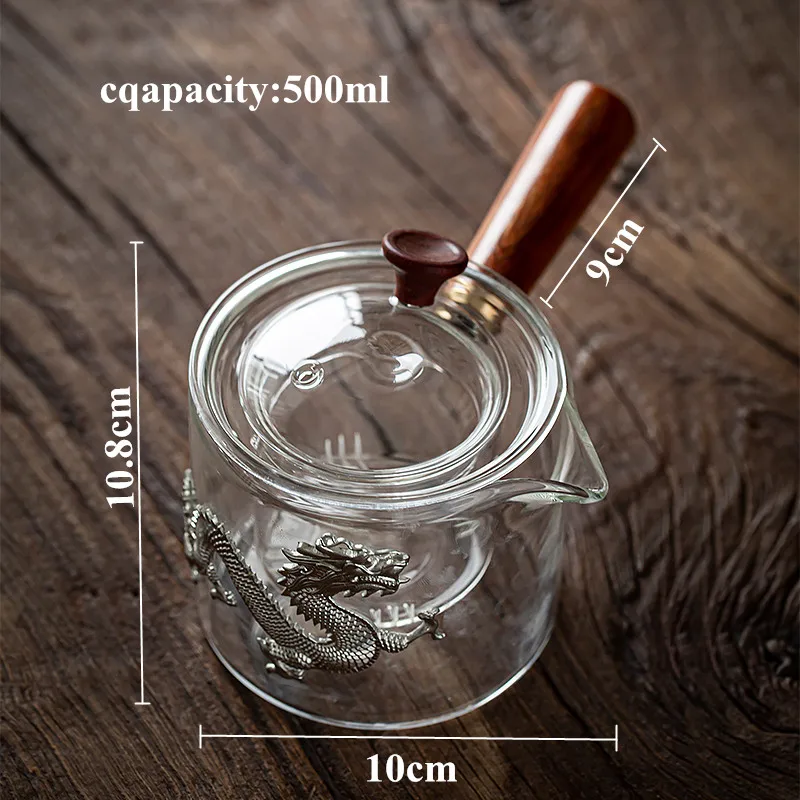 A glass teapot is placed on the side of the teapot to warm the tea