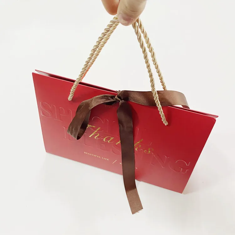 Custom logo luxury paper party  bags  for candle pink wedding cute packaging  clothing shopping bag gift bags Bowknot