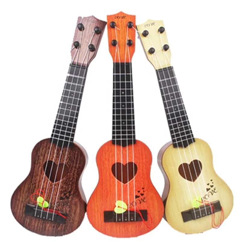 yuwei New toy Kids Vintage Early Education Musical Instrument Playing Guitar Beginner Boy Girl Toys Mini Ukulele Guita