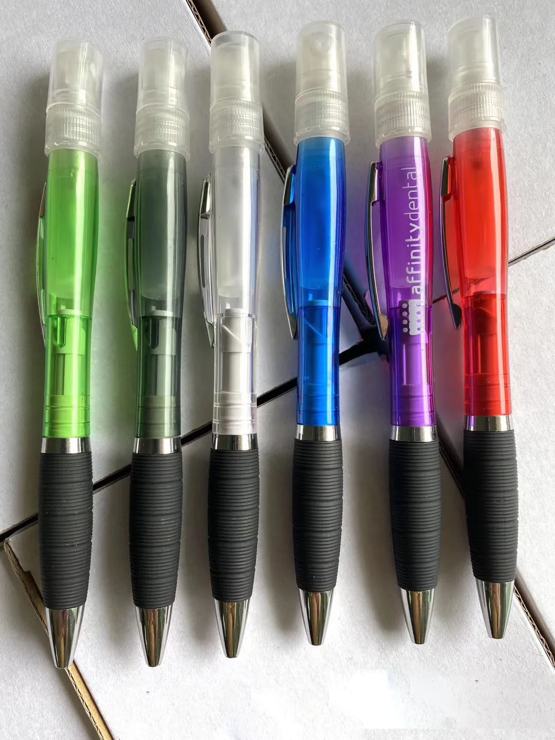 Hot selling small moq customized eco-friendly plastic ball pen with alcohol sanitize spray for promotion and advertising