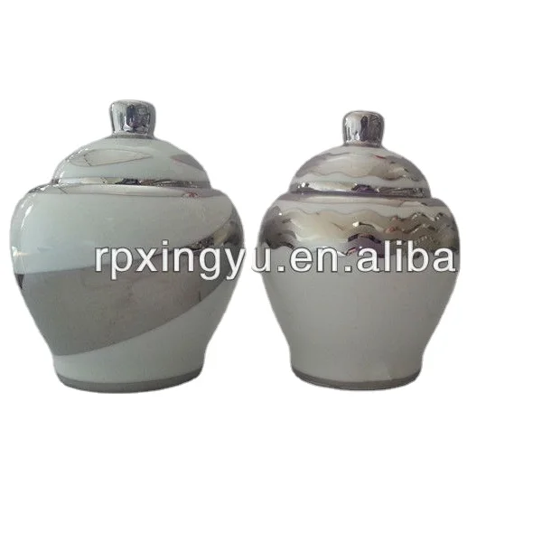 
Porcelain silver sugar pot with spoon 