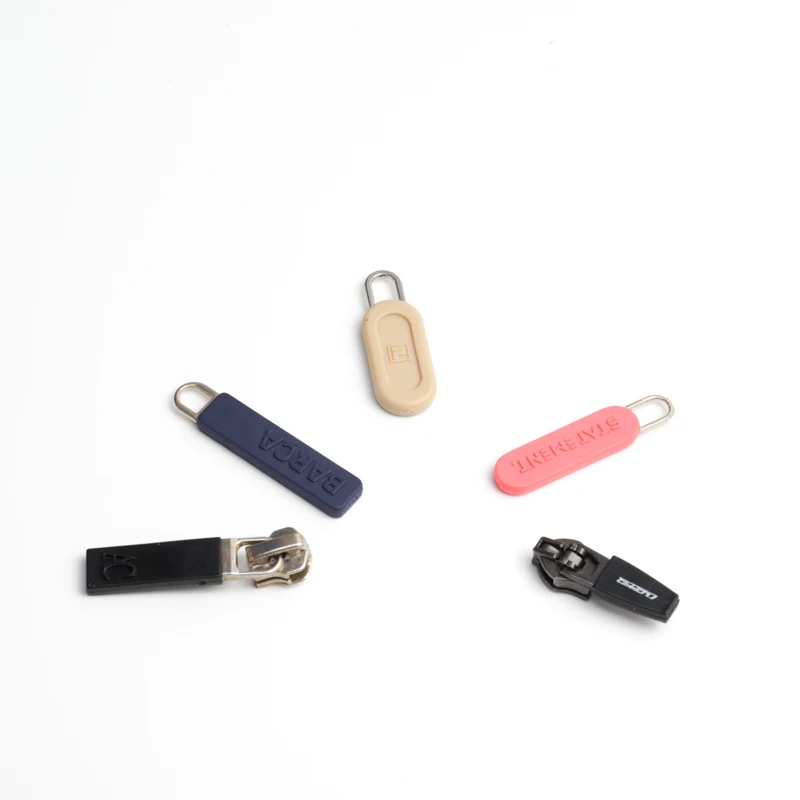 Custom woven rubber silicone pvc logo plastic round zipper puller slider and puller with logo for bag