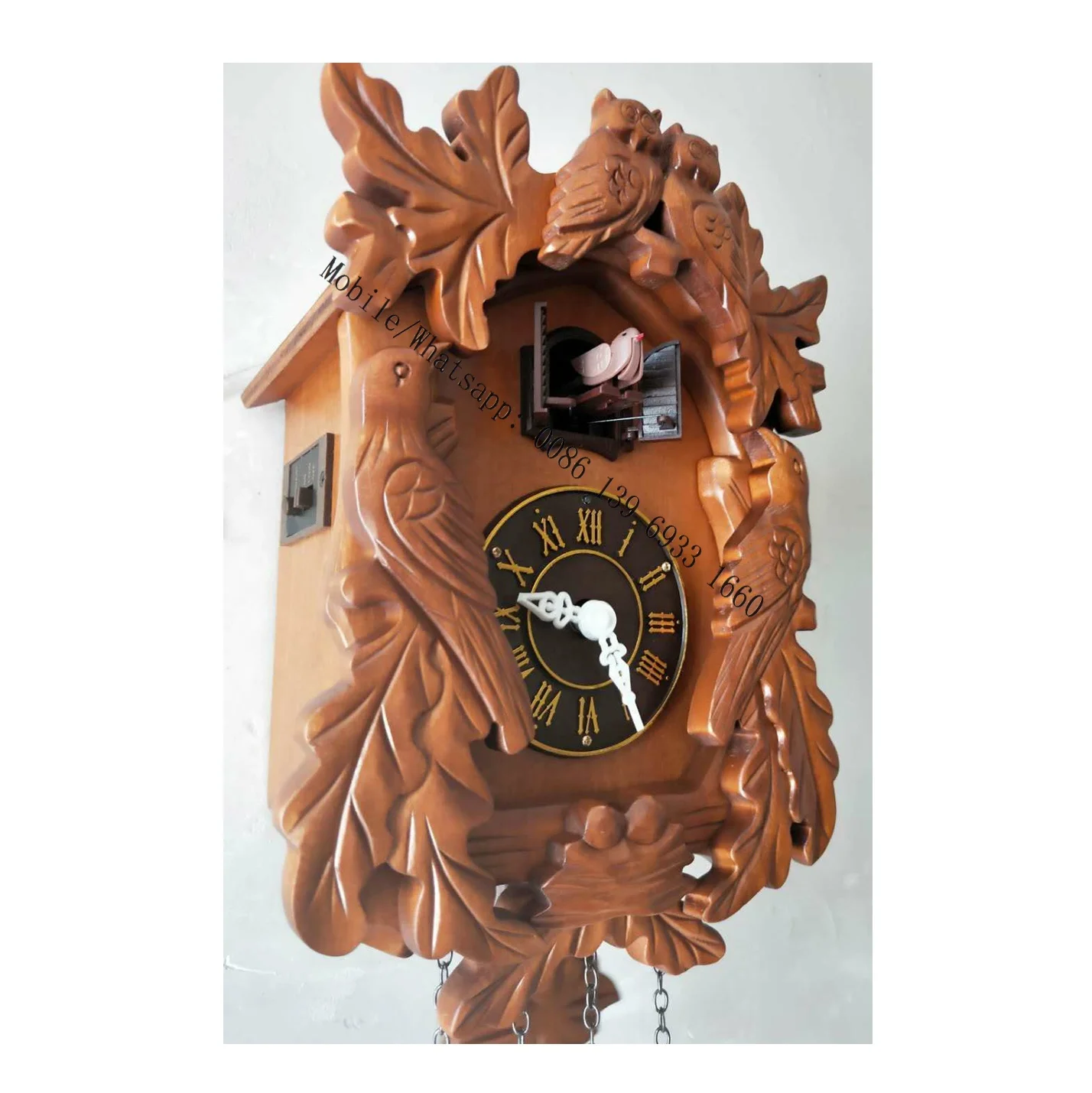 Standard Quartz Cuckoo Clock Black Forest House with Moving Train, with Music EN 48110 QMT