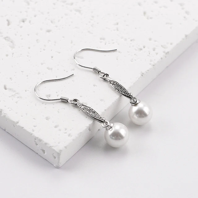 2023 High-End S925 Pure Silver Pearl Dangle Earrings Feminine Temptation with Luxurious Niche Design Long Elegant Style