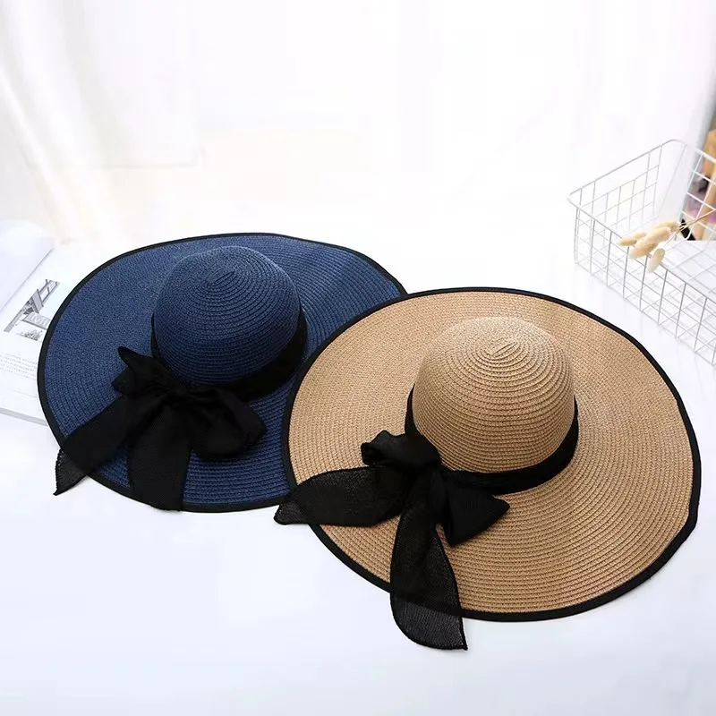 2022Summer new straw hat bowknot sunshade big hat along the ladies beach sunshade big straw hat manufacturers wholesale