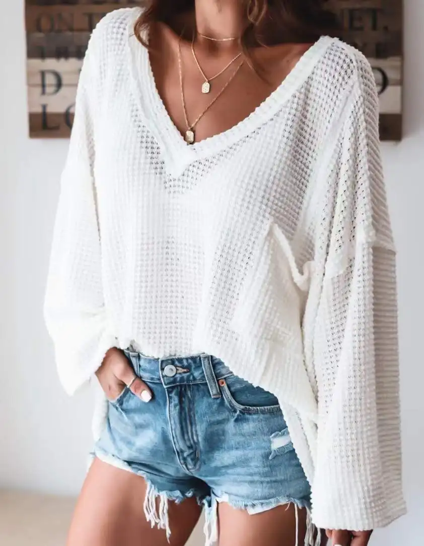 2023 Solid color sexy deep V-neck long-sleeved cut-out pullover casual loose plus size women pullover sweater clothing