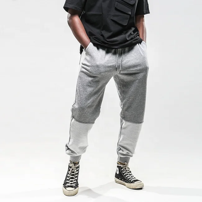 OEM high quality solid color elastic drawstring cotton patchwork jogger pants casual workout sweatpants couple streetwear stock