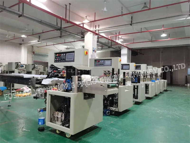 Yongxiong 2022 Automatic Chewy Oat Nut Granola Bars Packaging Machinery Candy Caramel Peanut Bar Packing Machine