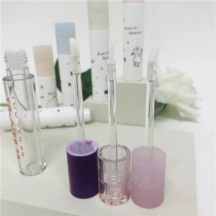 
Custom different volume clear plastic lip gloss soft tube Round square lipstick tube container with unique head 