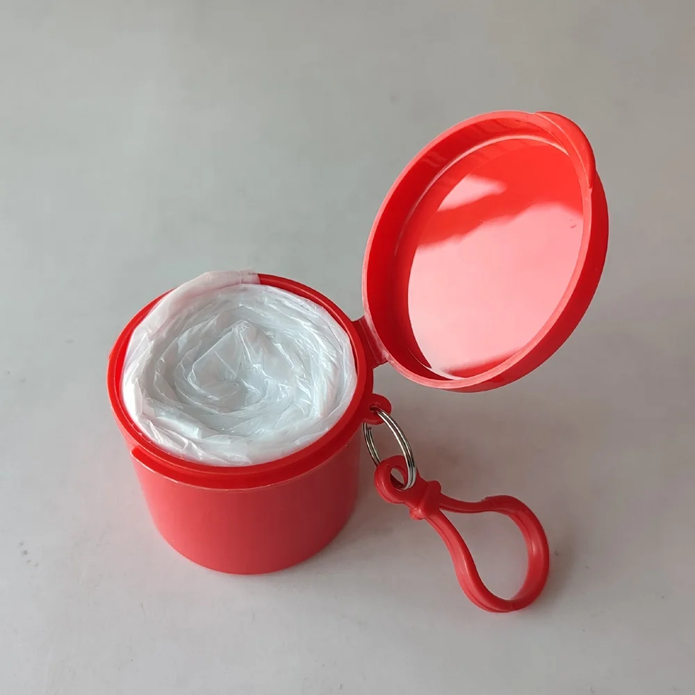 
disposable raincoat in a plastic round box 