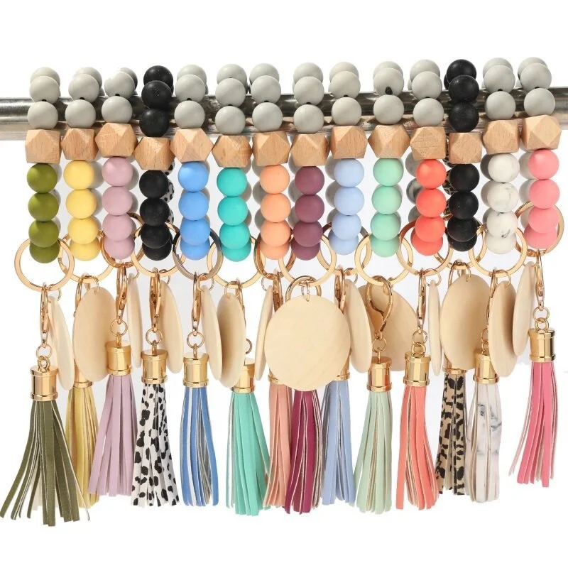 Wholesale silicone bead wristlet keychain with wood pendant woman blank silicone keychain