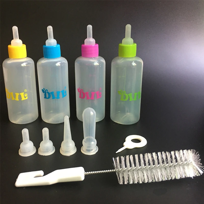 Factory wholesale pet supplies dog pet nursing bottle puppy pet dog cat milk feeding bottle feeder kit with nipples and brush