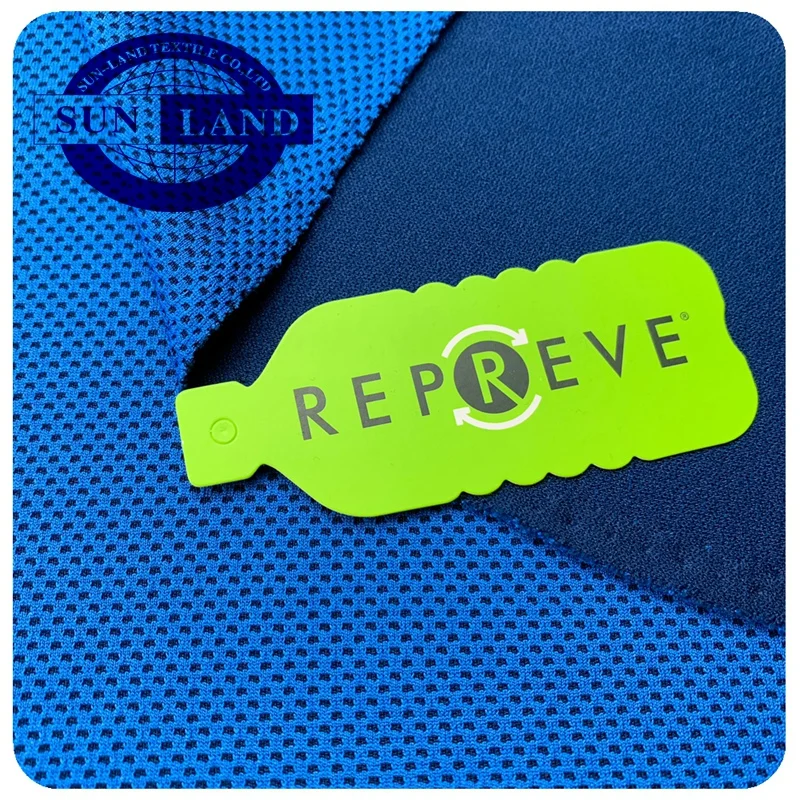 eco friendly product clothing 45% repreve recycled polyester 55% cation polyester two-color knitted honeycomb sports mesh fabric