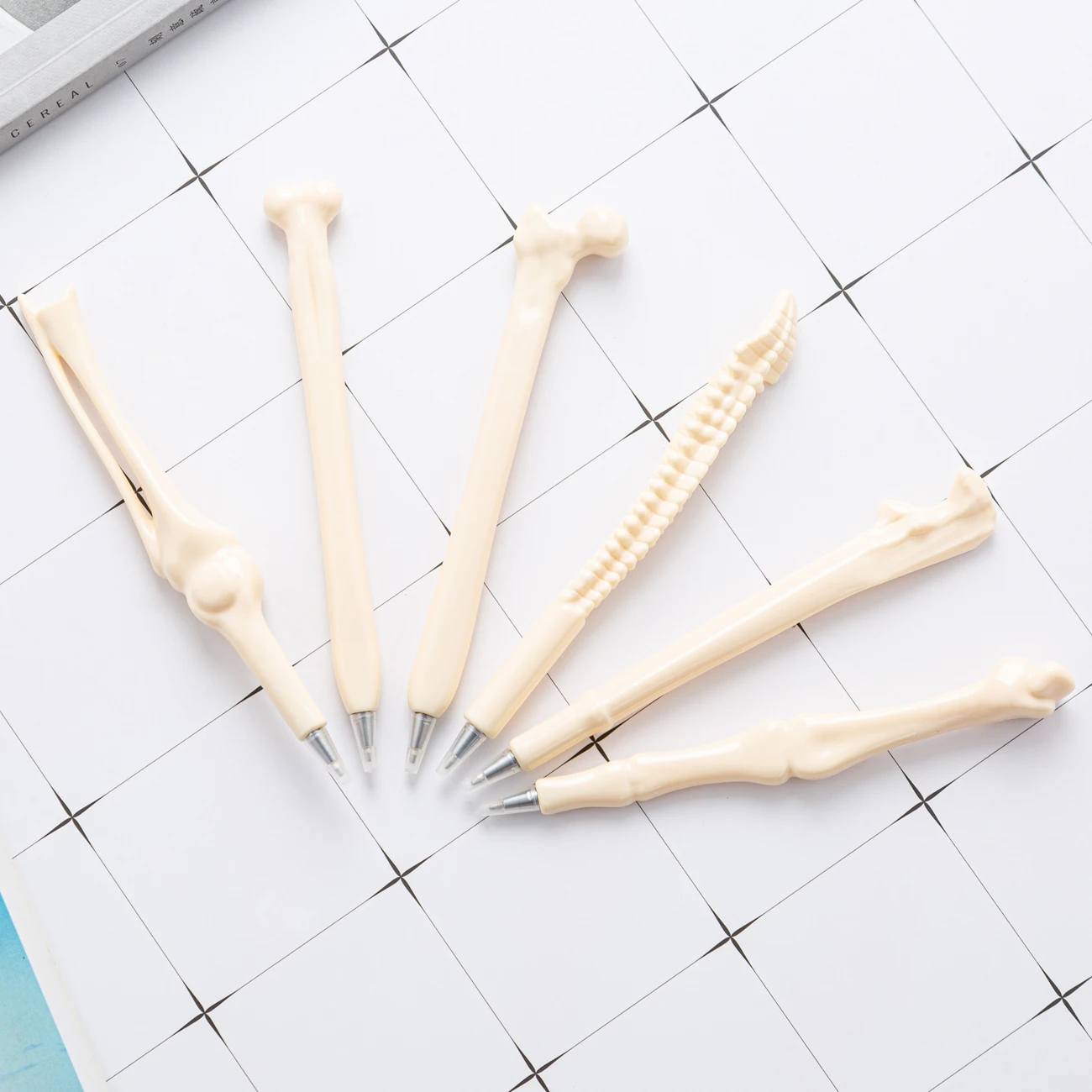 Novelty plastic creative design bone shape ballpoint bone pen promotional for Hospital medical writing