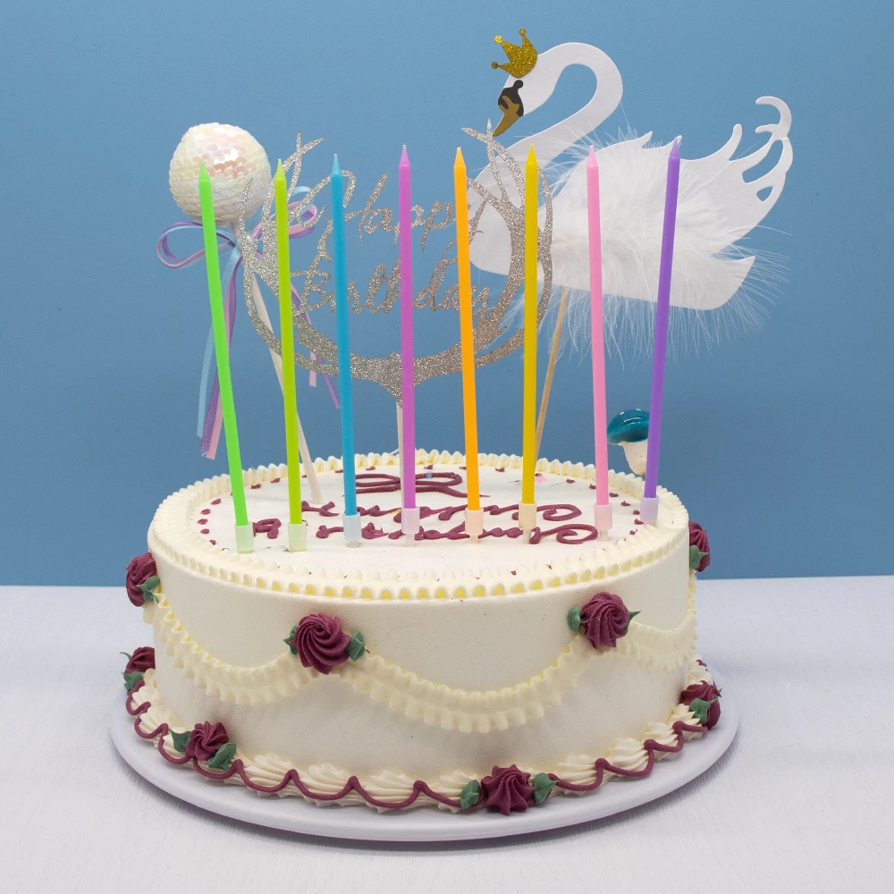 Cake decorated with rainbow slender pencil candles birthday party light luxury bronzed box with candles