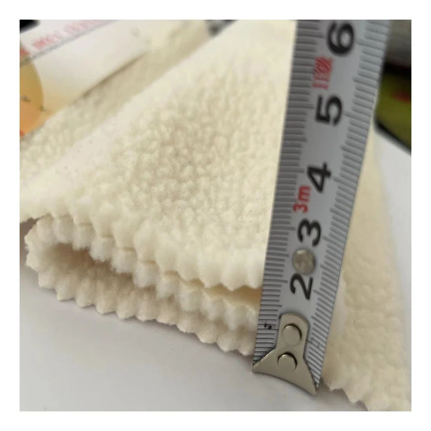 Hot sales 100%polyester single lamb fleece fabric lamb wool fabric keep warm sustainable for Garment coats