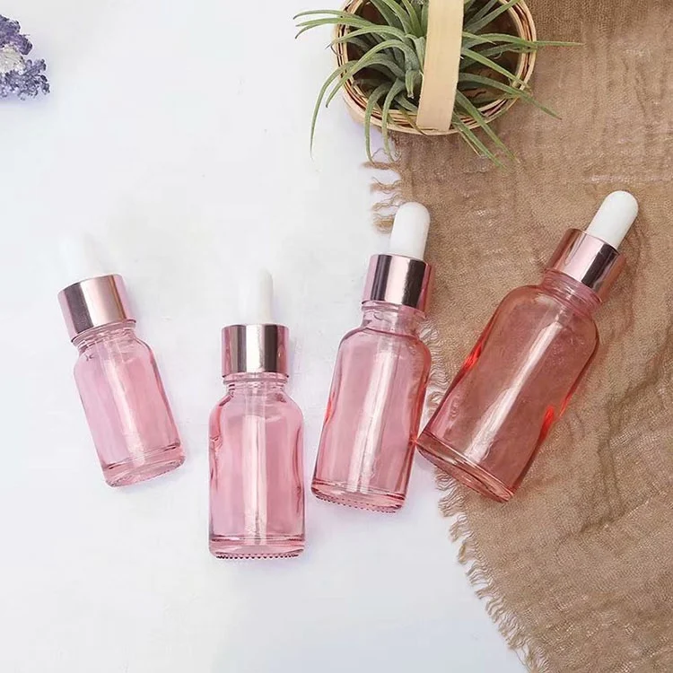 Alibaba hot selling custom size pink glass dropper bottle with delicate gift box