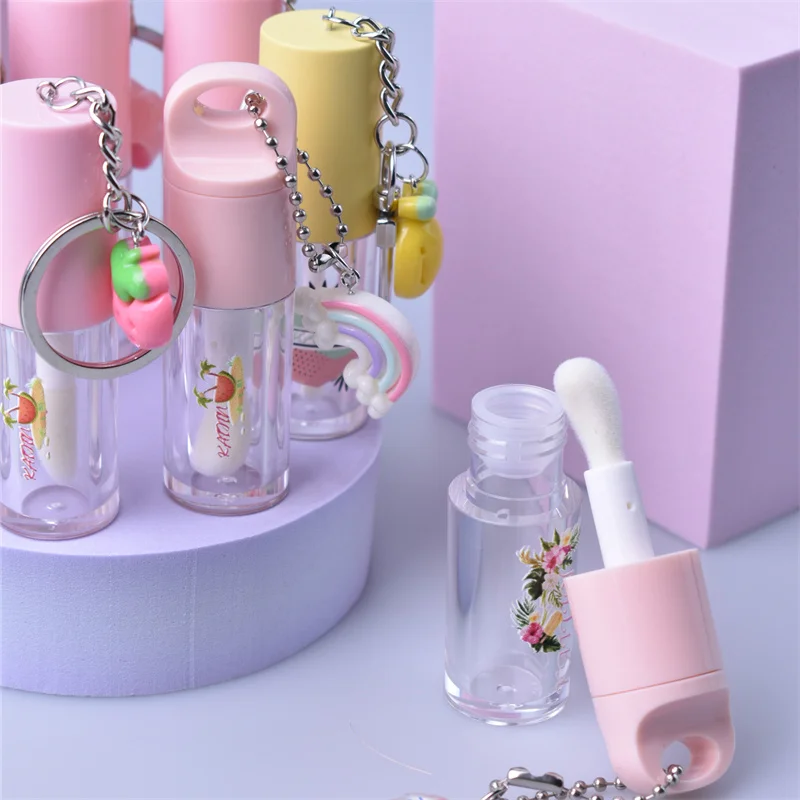 Cute glossy Private Label Vendor lip gloss keychain for kids 4ml empty containers tubes Customized Lip oil gloss tube with wand