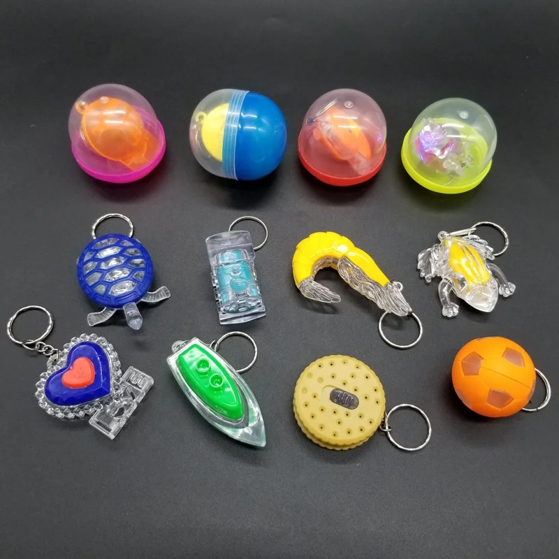 2022 Hot Sale Transparent Plastic Flashing LED Light up Keychain Toys for Capsule Vending Machine