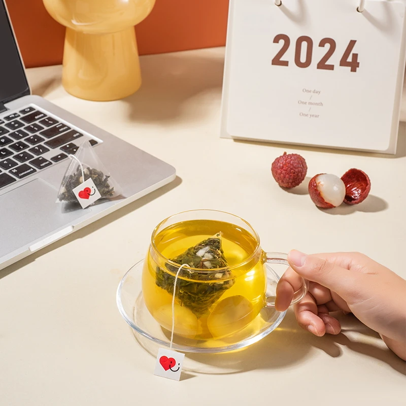 2024 New Flavors private label Biodegradable Pyramid Triangle tea bags Green Tea/black tea/tieguanyin tea