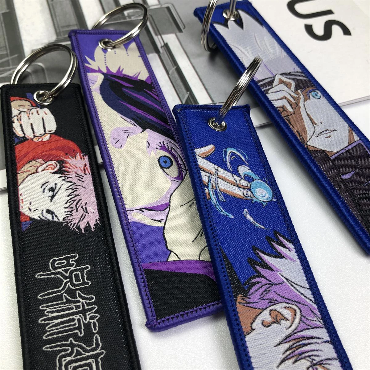 Wholesale 1000 Jet tag Embroideryc Anime Keychain  Demon Slayer Double-sided Keychain Motorcycle Car Anime Embroidery Keychain